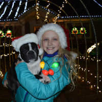<p>BFFs Mia and Holly get ready to hand out candy canes to visitors.</p>