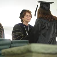 <p>Karen R. Lawrence, president of Sarah Lawrence College, confers degrees to graduating students.</p>