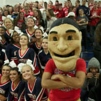 <p>The Ketcham mascot keeps the crowd involved.</p>