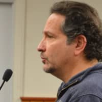 <p>Dominick Scala, owner of the Cork and Keg in the Block 419 condemnation zone. He was reassured that, should his business be moved, he will get relocation assistance.</p>