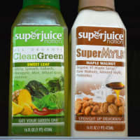 <p>Cold-pressed CleanGreen Sweet Leaf juice and Maple Walnut SuperMylk.</p>