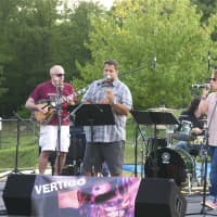 <p>Families and friends gather to share food and fun at Putnam Valley&#x27;s Summer Concert Series. The band Vertigo performed last weekend.</p>