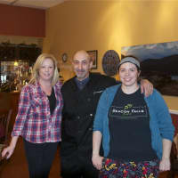 <p>Beacon Falls Cafe owner Bob Nevelus (center) and some of the staff from the cafe.</p>