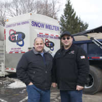<p>Fairfield Director of Public Works Joe Michelangelo (left) and Connecticut Tank Removal President Joe Palmieri showed off the Snow Melter on Friday in Fairfield.</p>