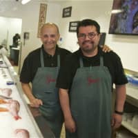 <p>Butcher shop manager and Master Butcher Peter Kissel (L) and store manager Jamie Martinez show off the store&#x27;s fresh seafood.</p>