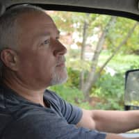 <p>Driving a truck loaded with glass bottles of milk is careful work, according to Christian Singleton of Organic Milk Corp. A sudden stop can be disastrous to the product.</p>
