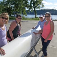 <p>Members of a novice sweep rowing class get ready to hit the Hudson River.</p>
