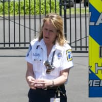 <p>Norwalk Hospital Paramedic Supervisor Lynn Ryder talks to students about safety at the Side by Side School in Norwalk.</p>
