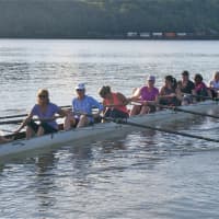<p>Rowers take off on a eight-man scull, with coxswain.</p>