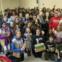 <p>Volunteers met Friday night in Carmel to pack 237 care boxes for U.S. soldiers.</p>