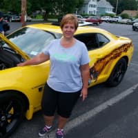 <p>Laura Claytor of Union Vale, with her Transformers-themed 2010 Camaro.</p>