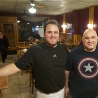 <p>Volare owners Dino (L) and Alfredo Mazzotta (missing is brother Alex) take a break to pose for a rare photo at the Lake Carmel restaurant.</p>