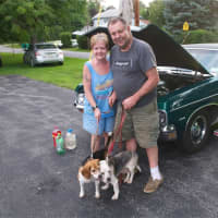 <p>Kathleen and Joe Matney, with their dogs and their 1970 Chevy Impala.</p>