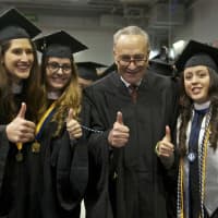 <p>Senator Charles Schumer poses with graduates at Friday&#x27;s ceremony.</p>