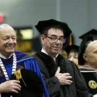<p>Pace University President Stephen J. Friedman (L) stands with faculty members during Friday&#x27;s ceremony.</p>