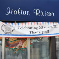 <p>A sign out front expresses the jubilation at Italian Riviera in Waldwick.</p>