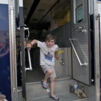 <p>Kids get a chance to check out emergency vehicles, motorcycles and the big rigs at Saturday&#x27;s Barnum Festival Touch-A-Truck event.</p>