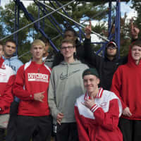 <p>Tappan Zee fans cheer on the Dutchmen during the opening round Class A playoff game.</p>