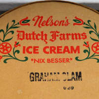 <p>A three-gallon carton of Nelson&#x27;s Dutch Farms Ice Cream stamped &quot;Nix Besser,&quot; meaning &quot;Nothing Better.&quot;</p>