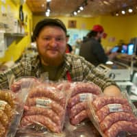 <p>Barb&#x27;s Butchery Manager &#x27;Pork Chop&#x27; Robbins, shows off some of the shop&#x27;s homemade sausages, as the shop preps for &#x27;Sausage Fest 3.&#x27;</p>