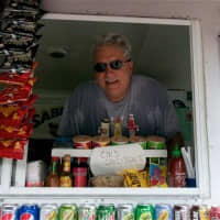 <p>Owner Sal Celona pauses for a photo during a recent lunch hour.</p>