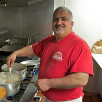 <p>Chef Gerardo Carino at work in the kitchen at Pizzeria Bacio.</p>