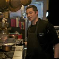 <p>A chef prepares soup at Crew Restaurant in Poughkeepsie.</p>