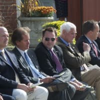 <p>Politicians and dignitaries watch Thursday&#x27;s ceremony.</p>