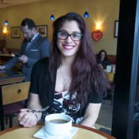 <p>Aliza Stitsky samples one of the soups at Crew Restaurant.</p>