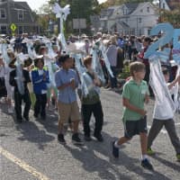 <p>Students from the Julian Curtiss School, representing 60 countries and speaking 30 languages, celebrate U.N. Day Thursday. It was the 25tyh anniversary of the school&#x27;s U.N. Day celebration.</p>