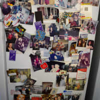 <p>Helen Boyle of Emerson loves to be surrounded by pictures of her family, such as these on her refrigerator.</p>