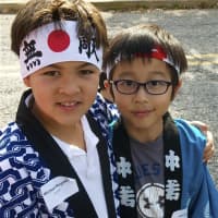 <p>Students representing Japan march in the Julian Curtiss School&#x27;s Parade of Nations at Thursday&#x27;s U.N. Day celebration in Greenwich.</p>