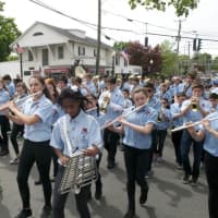 <p>Musical groups step off in the Memorial Day Parade in Bethel on Sunday.</p>