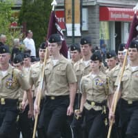 <p>Students in the ROTC program step off for the Memorial Day Parade, held early in Bethel.</p>