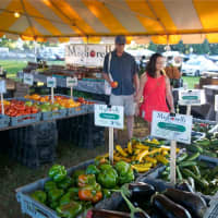 <p>This farmer&#x27;s market greets visitors at one of the fair&#x27;s main entrances.</p>
