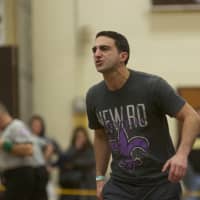 <p>A New Rochelle coach barks instructions during a final.</p>