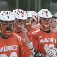 <p>Mamaroneck players watch from the sidelines.</p>