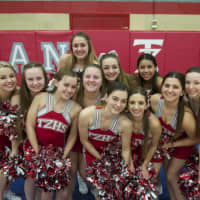 <p>TZ cheerleaders support their team.</p>