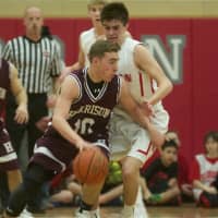 <p>Tappan Zee hung on to narrowly beat Harrison in a playoff game Friday night at TZ High.</p>