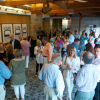 <p>Attendees mingle during the fundraiser for the Bedford Playhouse Friday night.</p>