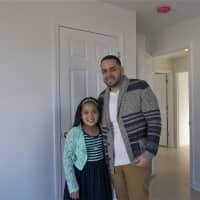 <p>Jeymar Soto with daughter Jeydalis in one of the home&#x27;s bedrooms.</p>