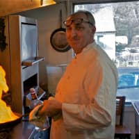 <p>Chef and owner Iber Krasniqi gets cooking in his Benvenuto kitchen.</p>