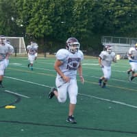 <p>Ossining players prepare for the new season.</p>