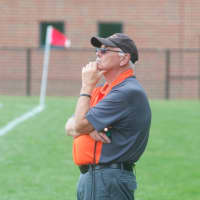 <p>Dover High boys soccer coach Bob Esposito watches his team at a preseason scrimmage.</p>