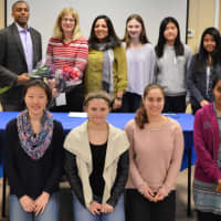 <p>Most everyone involved in the North Jersey Brain Bee at Reebel in Waldwick. In the front row are runner-ups Lily Ge of Old Tappan, second from left, and Tamanna Sarowar of Bergenfield, far right.</p>