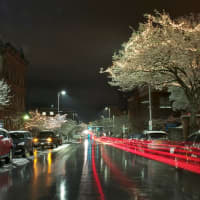 <p>Ice covered trees and a car&#x27;s light trails were captured near the Poughkeepsie waterfront.</p>