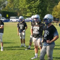 <p>The Broncos get ready to open the season against Hackley.</p>