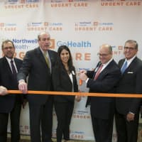 <p>Hospital and area officials, including Westchester Deputy County Executive Kevin Plunkett (second from L) and Phelps Hospital President Daniel Blum (second from R), cut the ribbon at the facility in Tarrytown.</p>