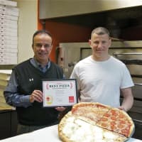 <p>Daily Voice Director of Media Initiatives/Managing Editor Joe Lombardi, left, presents Mama Pizza II owner Michael Notaro with the first-place plaque.</p>