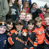 <p>Young fans enjoy the action Sunday at Brewster.</p>